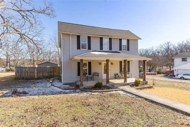 view of property with covered porch