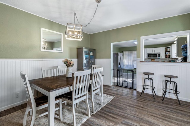 dining room featuring dark hardwood / wood-style flooring