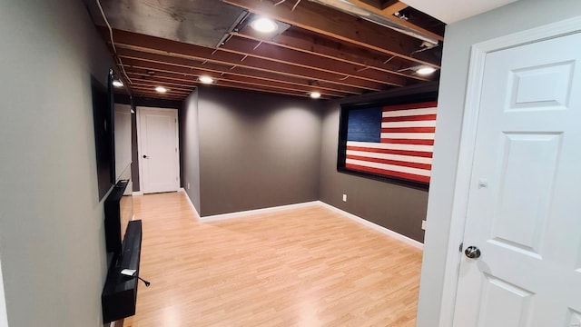 basement featuring light wood-type flooring