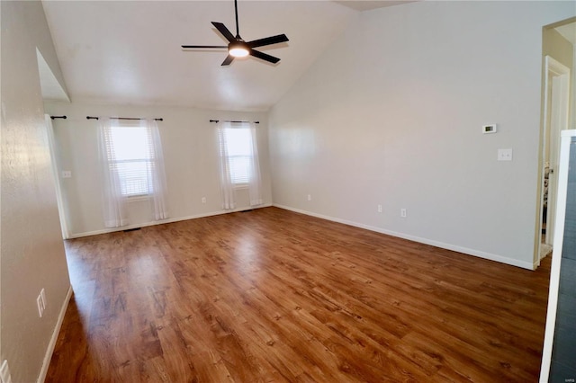 spare room with ceiling fan, hardwood / wood-style flooring, and high vaulted ceiling