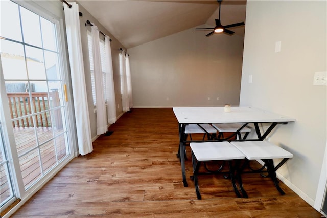 sunroom / solarium featuring vaulted ceiling and ceiling fan