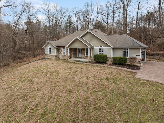 craftsman house featuring a front lawn and covered porch