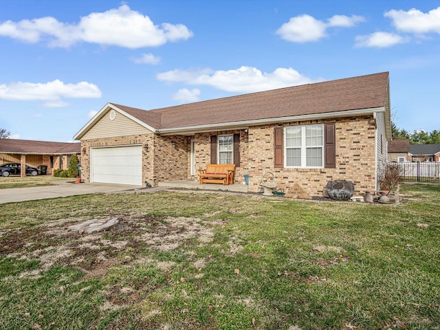 ranch-style home featuring driveway, a front lawn, an attached garage, and brick siding