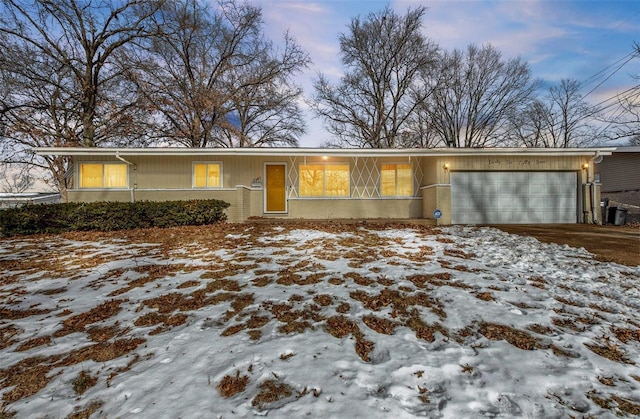 single story home with a garage