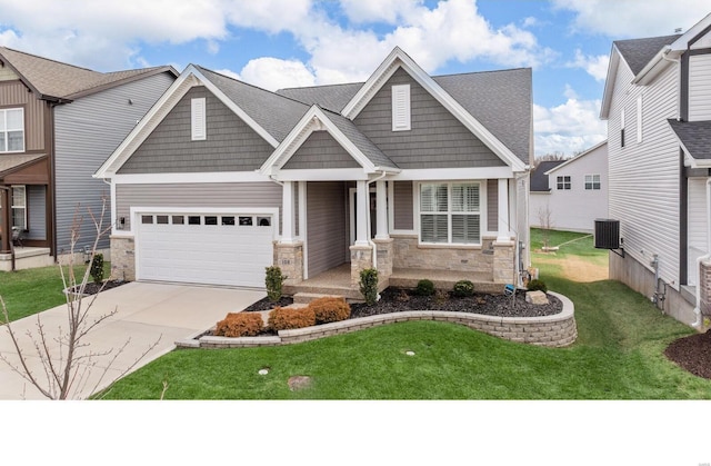 craftsman inspired home with cooling unit and a front yard