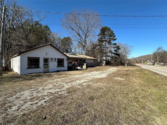 view of home's exterior featuring a lawn