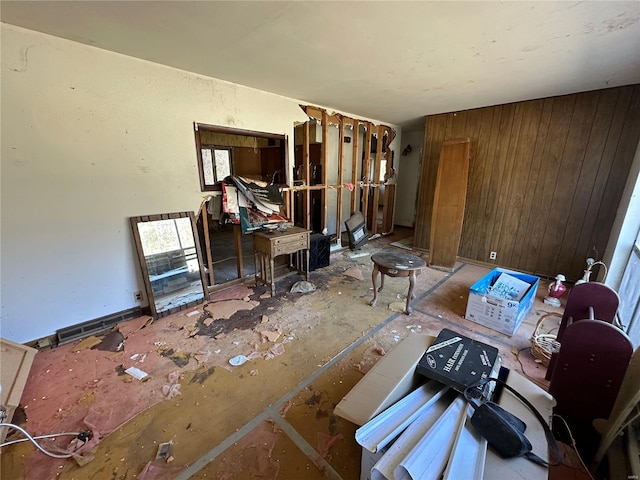 misc room featuring wooden walls