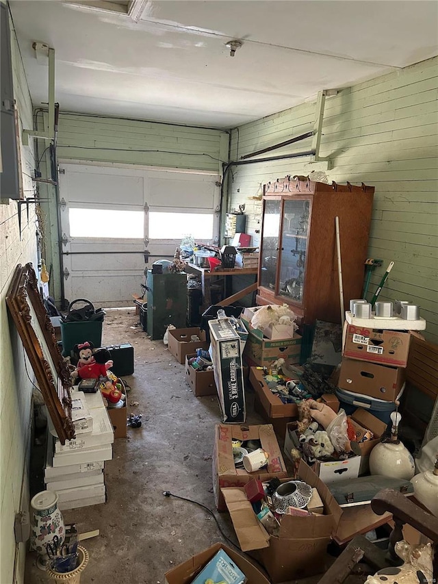 garage with wood walls