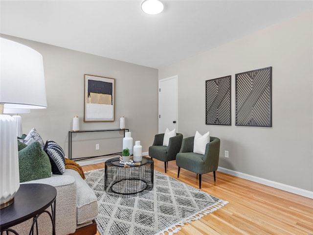 living area with wood-type flooring