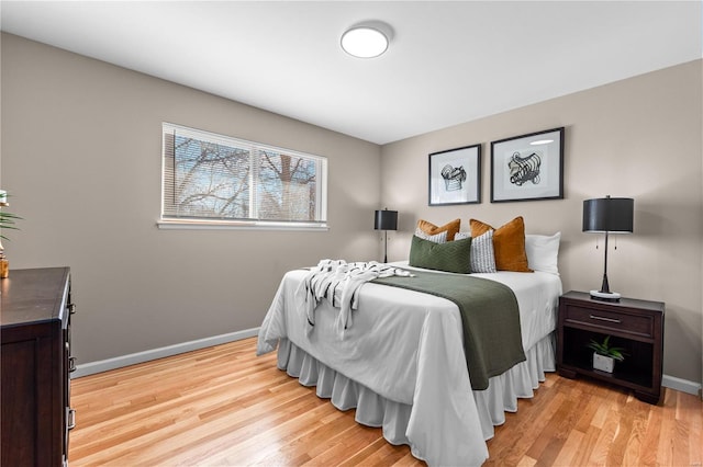 bedroom with light wood-type flooring