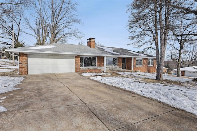 ranch-style home with a garage