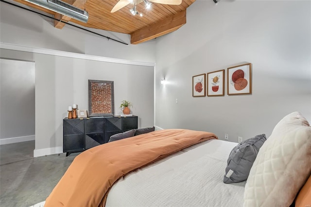 bedroom featuring beam ceiling, wood ceiling, concrete flooring, and ceiling fan