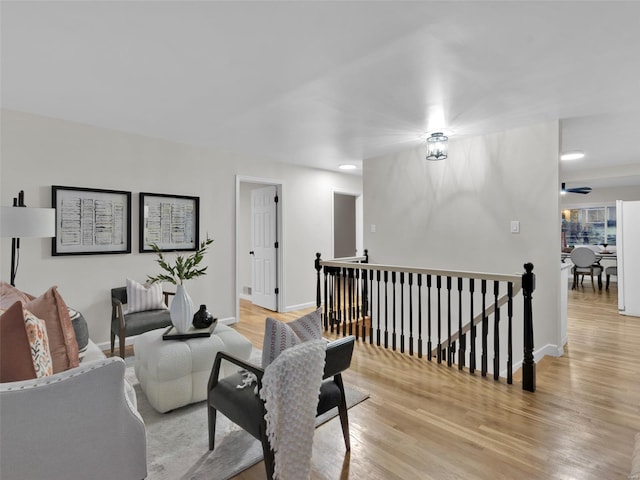 living room with light hardwood / wood-style flooring