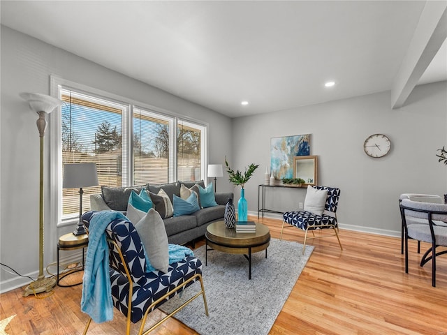 living room with recessed lighting, wood finished floors, and baseboards