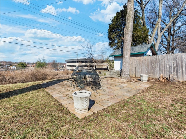 view of yard featuring a patio area and fence