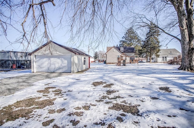 exterior space with an outdoor structure and a garage