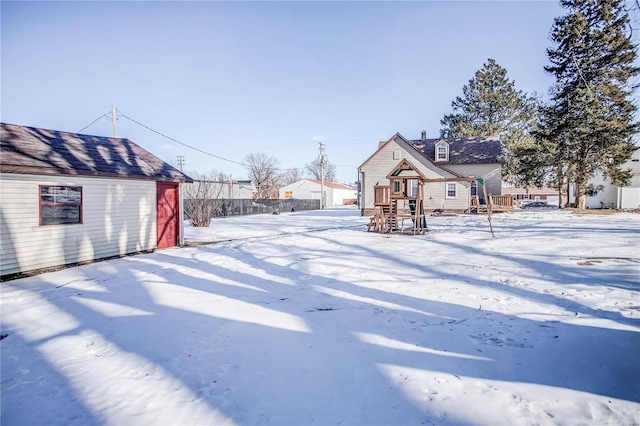 view of yard covered in snow