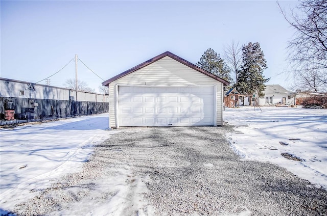 view of snow covered garage