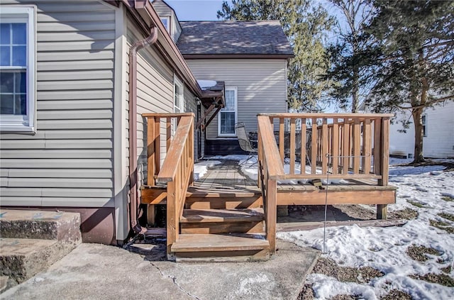 view of snow covered deck