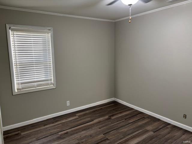 unfurnished room featuring ceiling fan, dark hardwood / wood-style floors, and ornamental molding