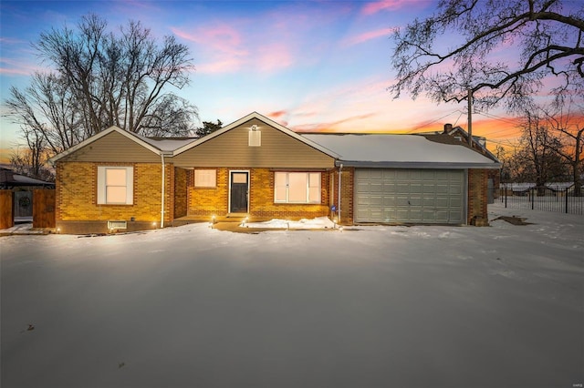 single story home with a garage