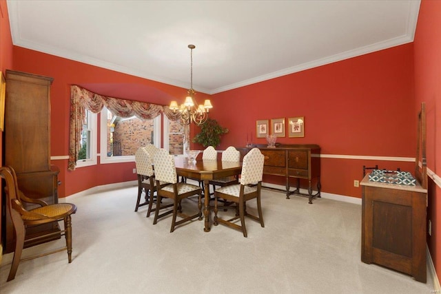 carpeted dining room with an inviting chandelier and ornamental molding