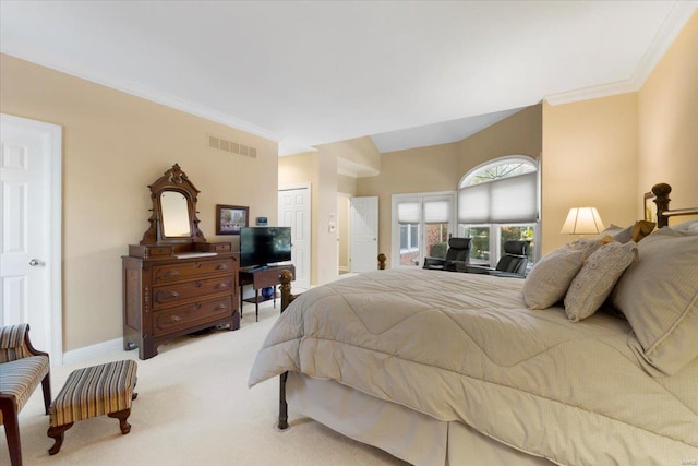 carpeted bedroom featuring ornamental molding and a closet