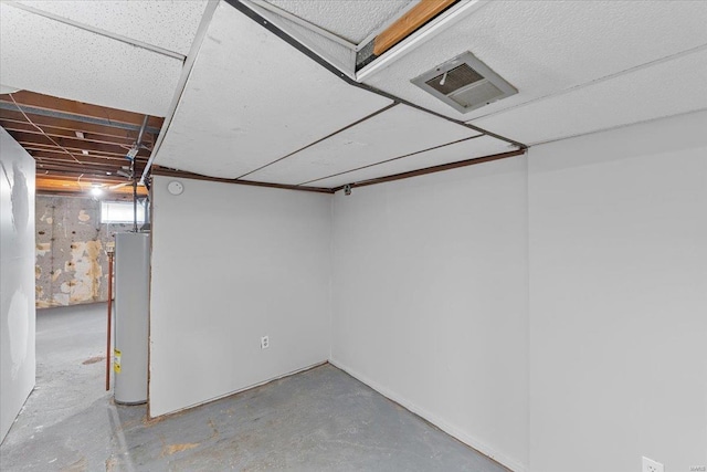 basement featuring gas water heater