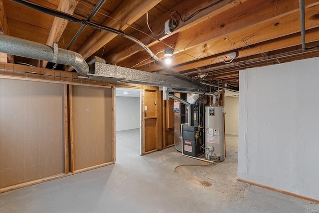 basement with gas water heater and heating unit