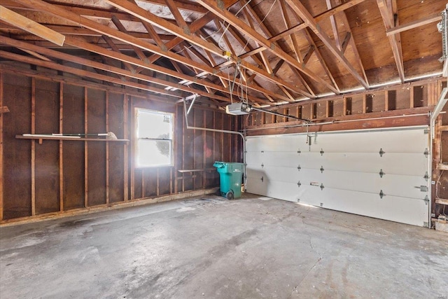 garage featuring a garage door opener