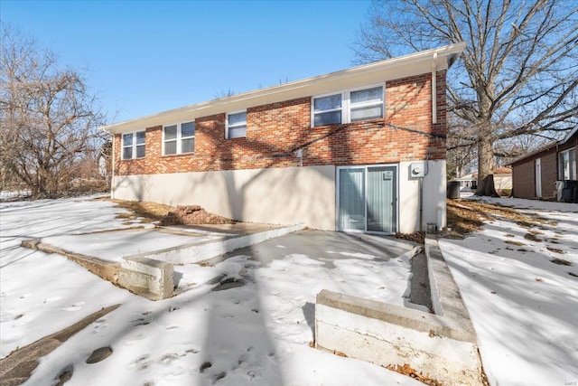 view of snow covered property