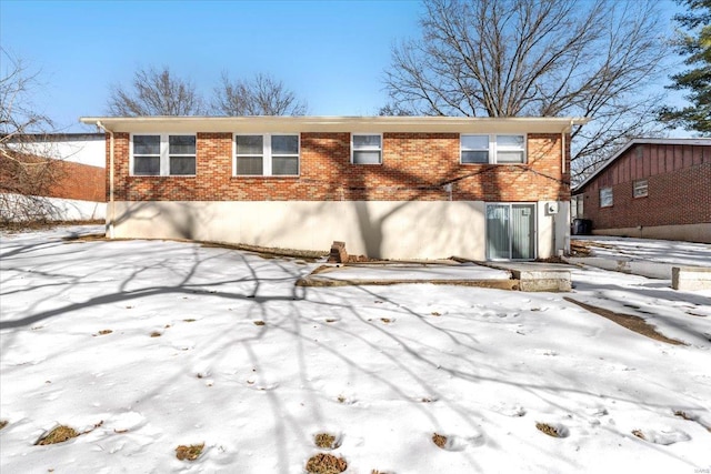 view of snow covered house