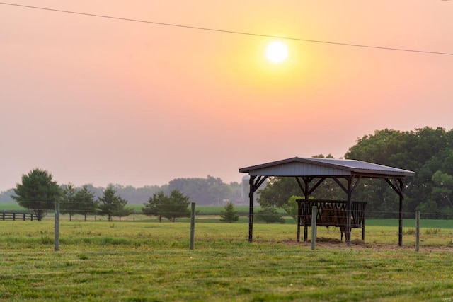 view of community featuring a lawn, a gazebo, and a rural view