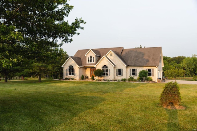 view of front of home with a front yard