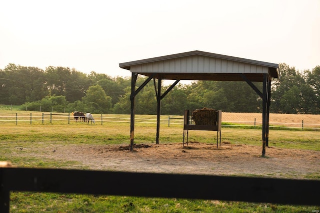 view of community with a rural view