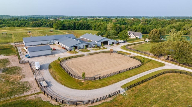 birds eye view of property featuring a rural view