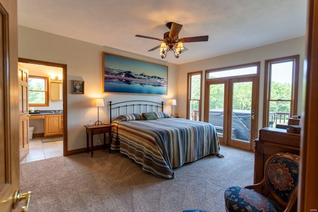 carpeted bedroom featuring ceiling fan, access to exterior, and connected bathroom