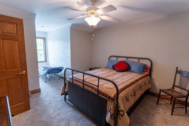 bedroom featuring ceiling fan and carpet floors