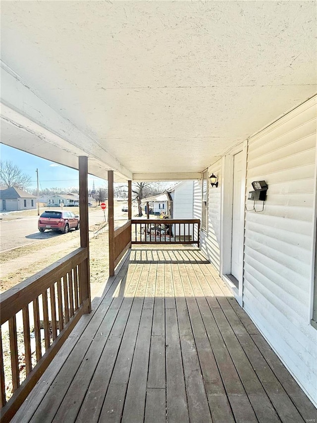 wooden deck featuring a porch