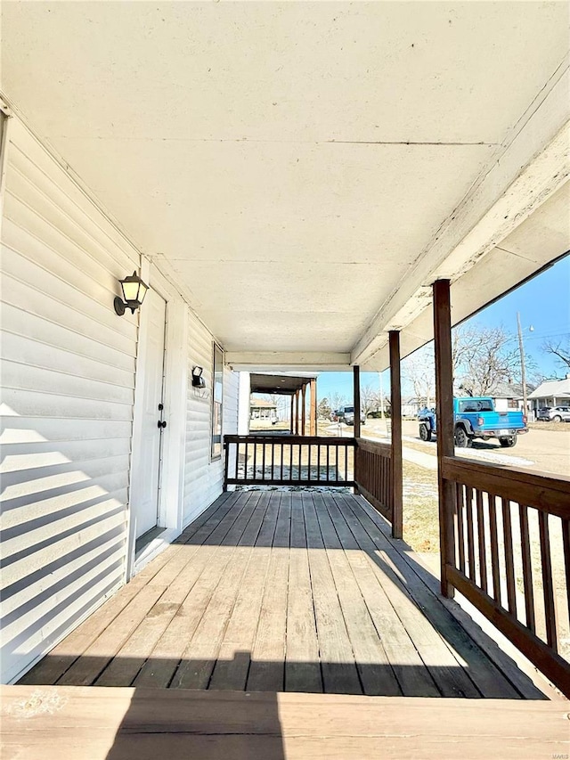 wooden deck featuring a porch