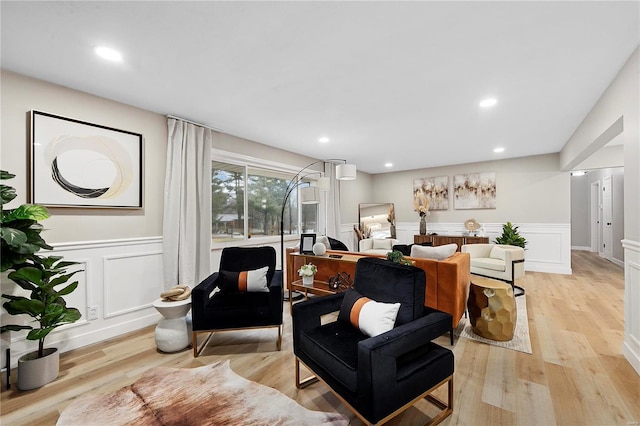 living room with light hardwood / wood-style flooring