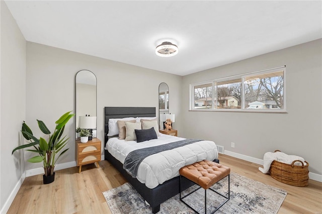 bedroom featuring light wood-type flooring