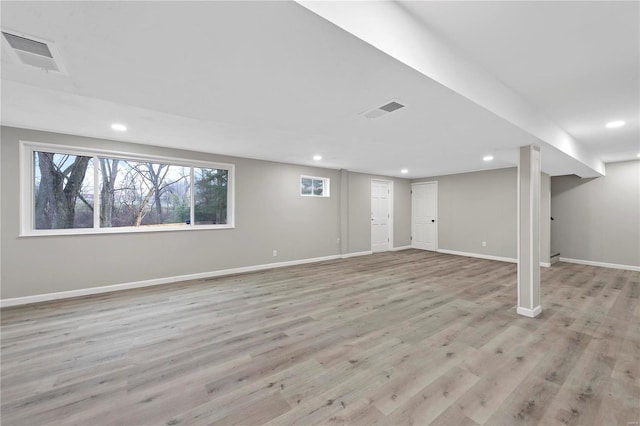 basement with light wood-type flooring