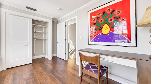 office featuring dark hardwood / wood-style floors and ornamental molding