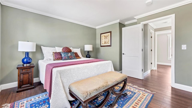 bedroom featuring dark wood-type flooring and crown molding