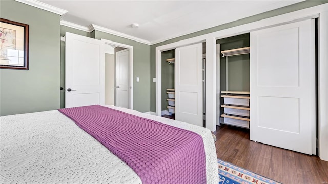 bedroom featuring dark wood-type flooring and ornamental molding