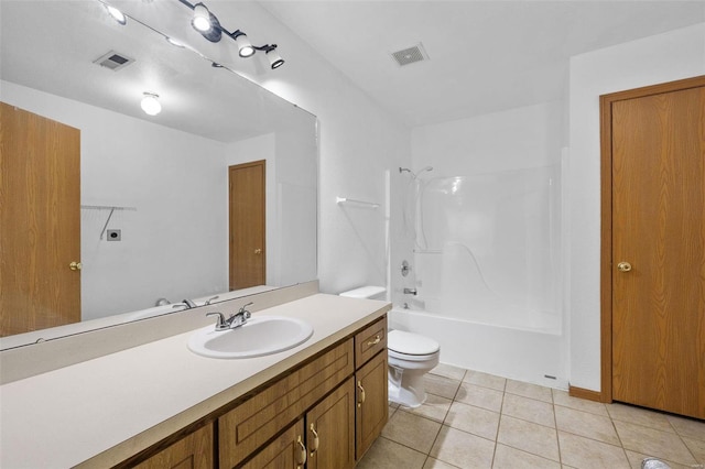 full bathroom with vanity, toilet, tile patterned floors, and shower / washtub combination