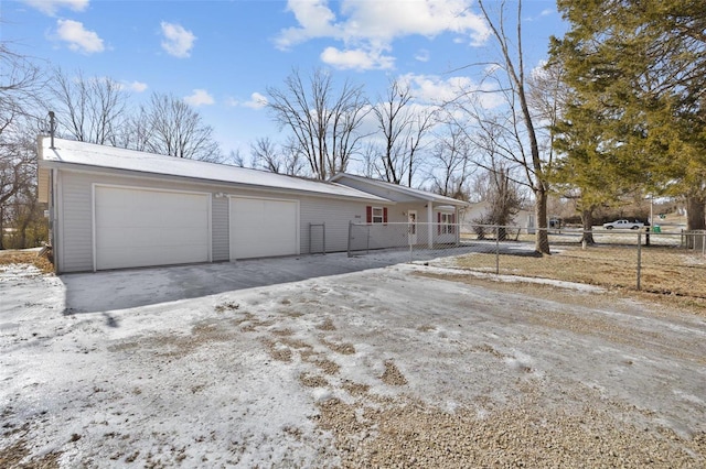 view of property exterior featuring a garage