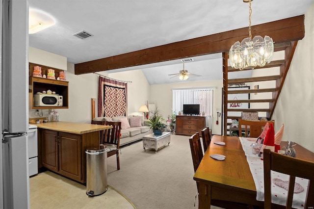 interior space with lofted ceiling with beams, ceiling fan with notable chandelier, and light colored carpet