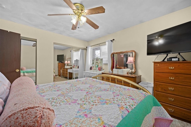 bedroom featuring ceiling fan